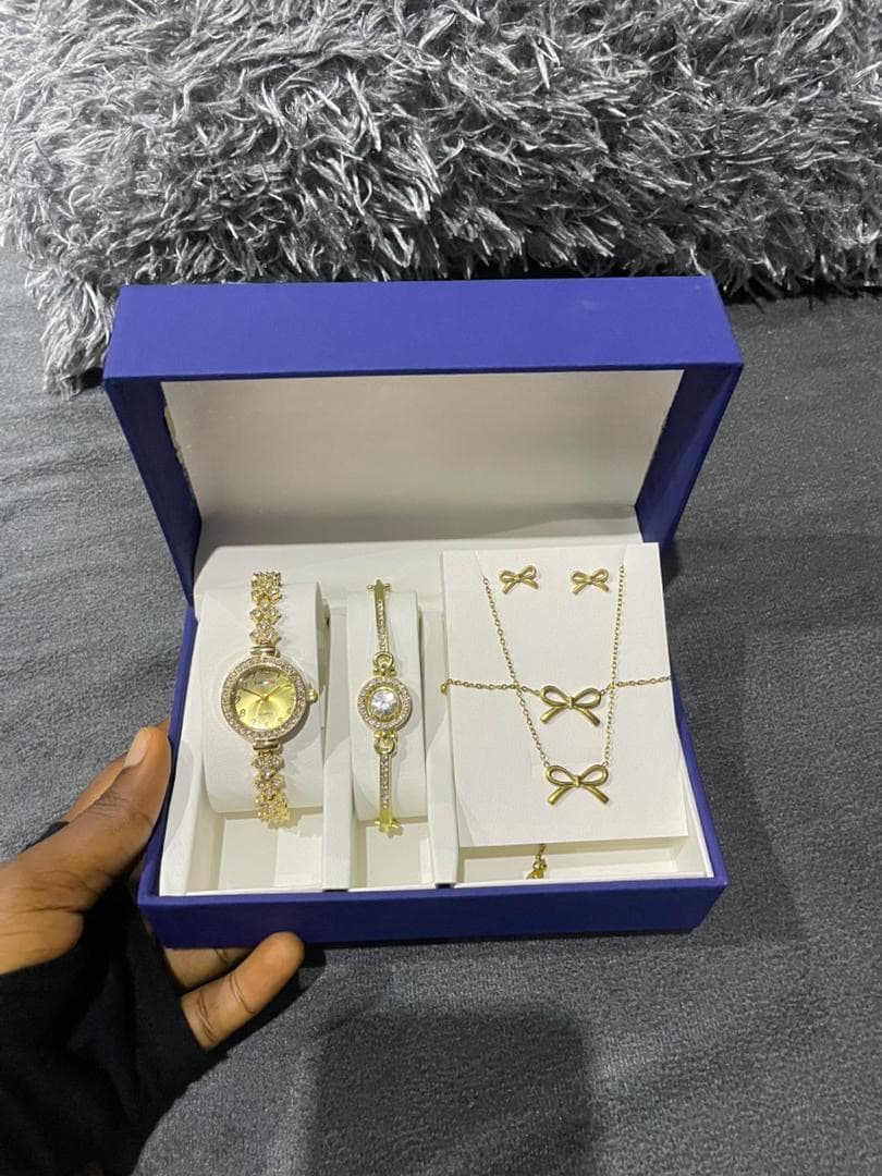 Necklace, wristwatch, earrings and bracelet