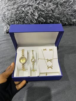 Necklace, wristwatch, earrings and bracelet